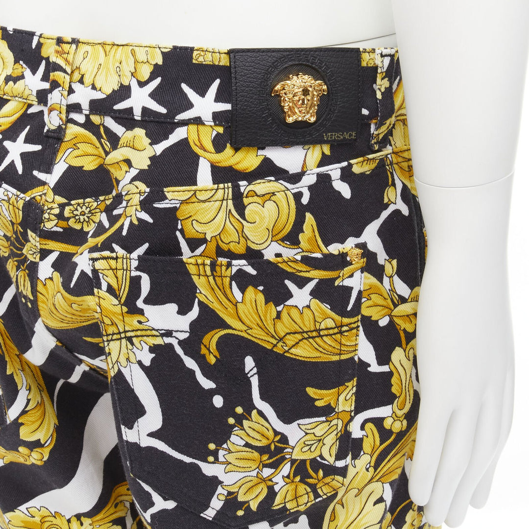 VERSACE 2019 Runway Savage Barocco gold Medusa stud jeans IT32
