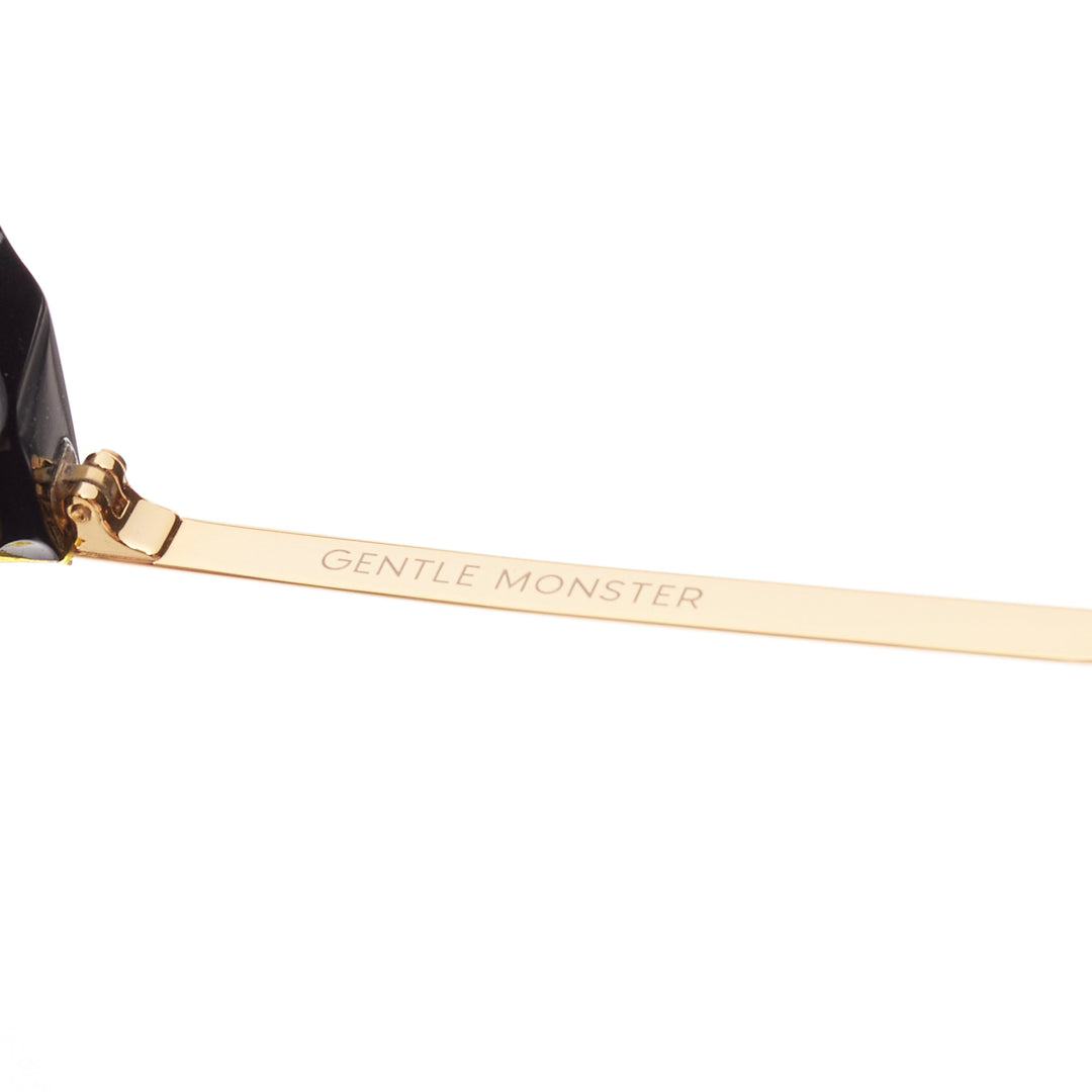 GENTLE MONSTER Lovesome black reflective lens gold oversized sunglasses