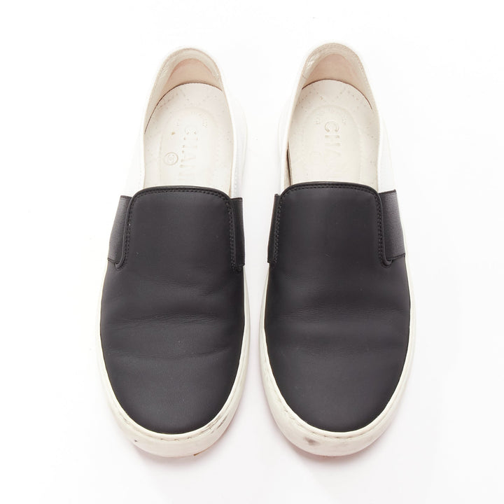 CHANEL black white leather CC logo back minimal classic skates sneakers EU36