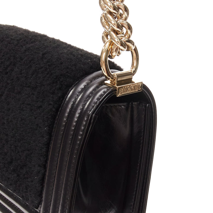 CHANEL Boy Small black shearling leather gold CC push lock chain flap bag