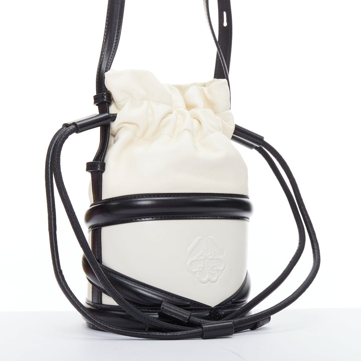 ALEXANDER MCQUEEN Soft Curve AM logo black white leather bucket bag