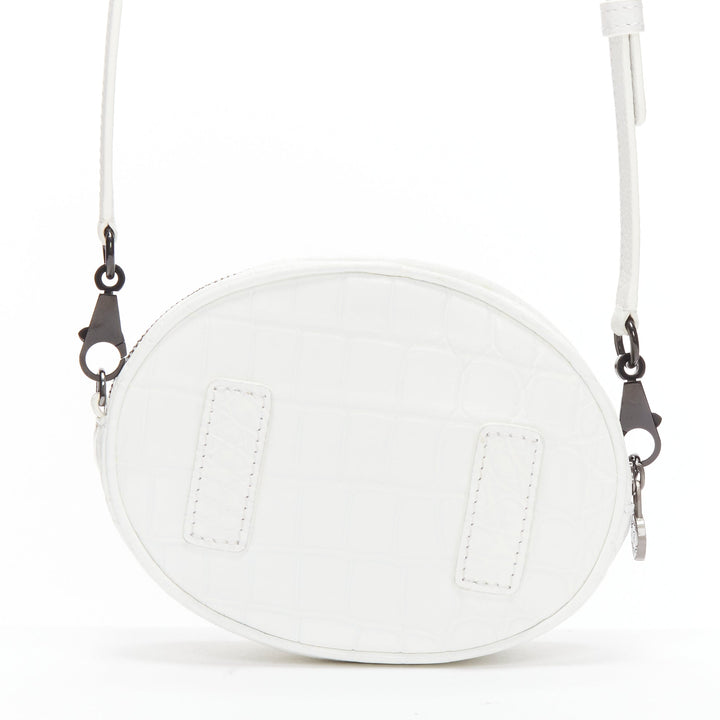FERIDA YANG Emma white matte scaled leather oval crossbody belt bag
