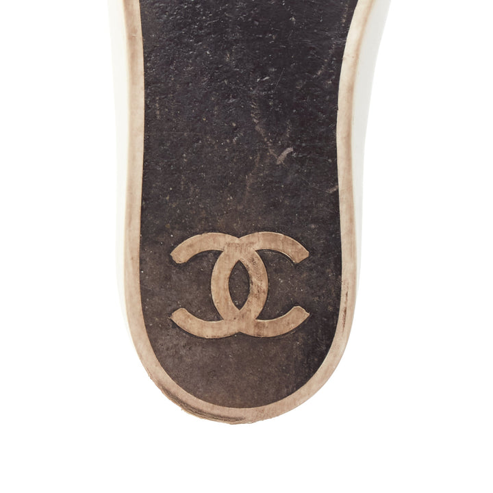 CHANEL black white leather CC logo back minimal classic skates sneakers EU36