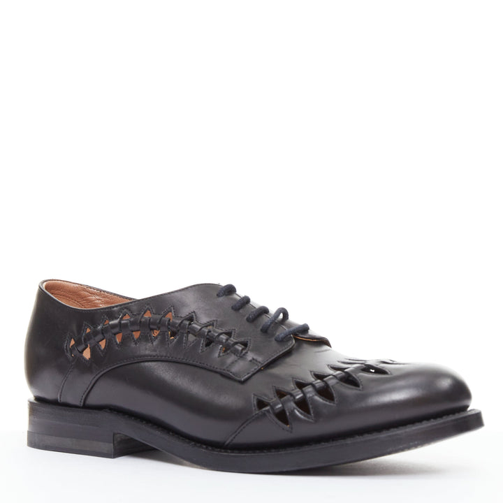 ALAIA Goodyear black leather laser cut out braided brogue EU38