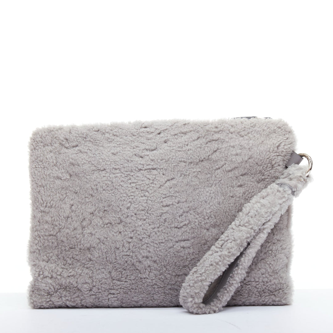 ERMENEGILDO ZEGNA grey lambskin shearling wrist strap zip clutch bag