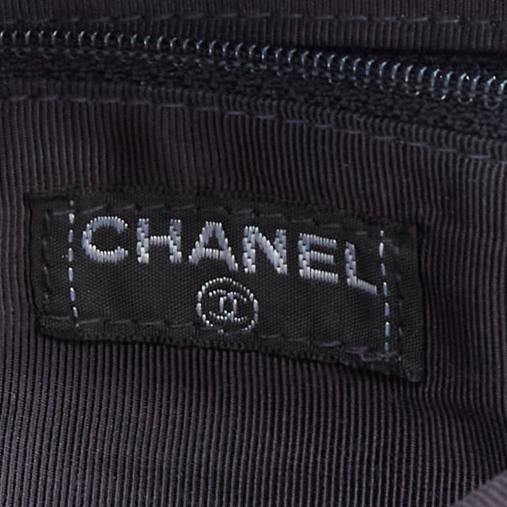 CHANEL Mademoiselle Chocolate Bar denim blue quilted clutch bag