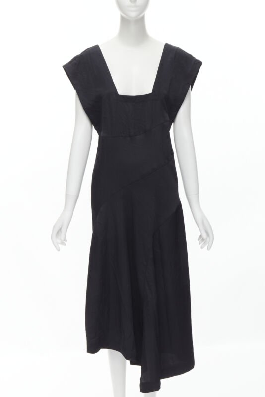 100% Authenticity Guaranteed Comme Des Garcons Black 0 Dress on Sale.  Available at JHROP jhrop_official