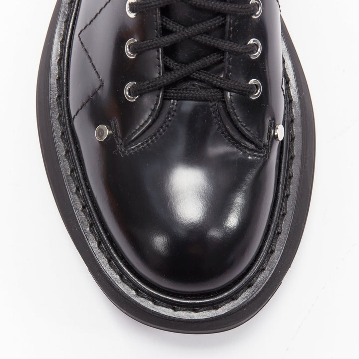 ALEXANDER MCQUEEN Tread black leather lace up combat knee high boot EU39