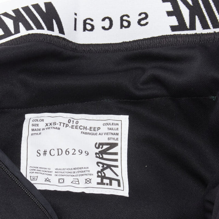 SACAI NIKE deconstructed windbreaker patchwork draped skirt XXS