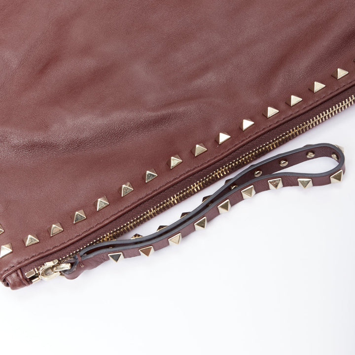 VALENTINO Rockstud rose gold burgundy leather studded logo clutch
