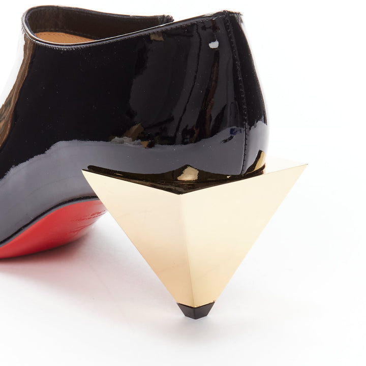 CHRISTIAN LOUBOUTIN Xilobooties 55 gold pyramid heel black patent pump EU38