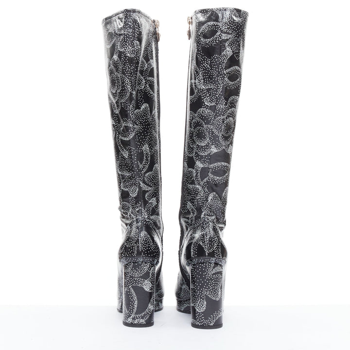 CHANEL 23A Runway white black CC camellia dotted logo print tall boots EU39