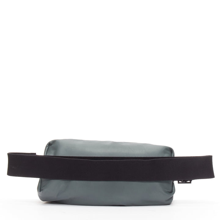 BOTTEGA VENETA The Body pouch grey smooth leather black sport strap waist bag