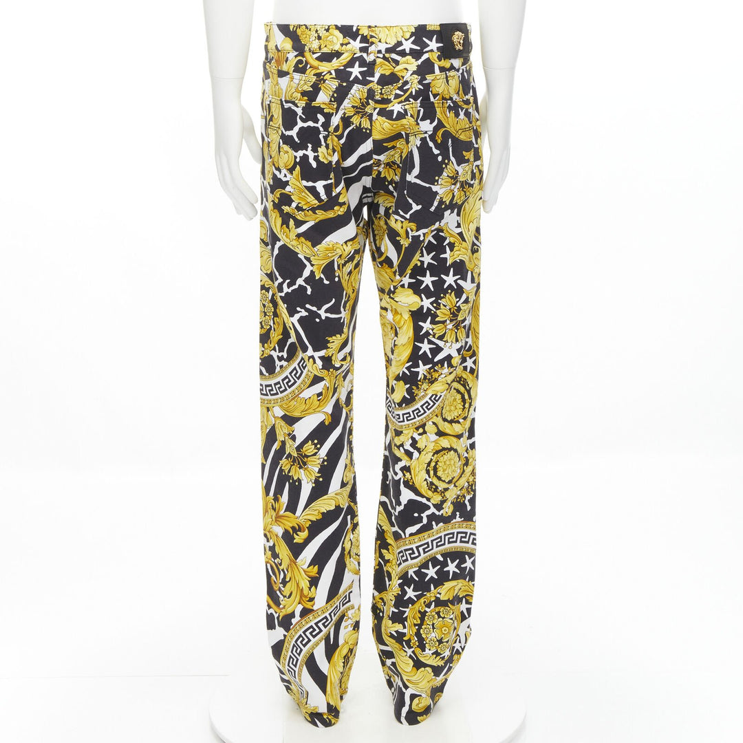 VERSACE 2019 Runway Savage Barocco gold Medusa stud jeans IT32