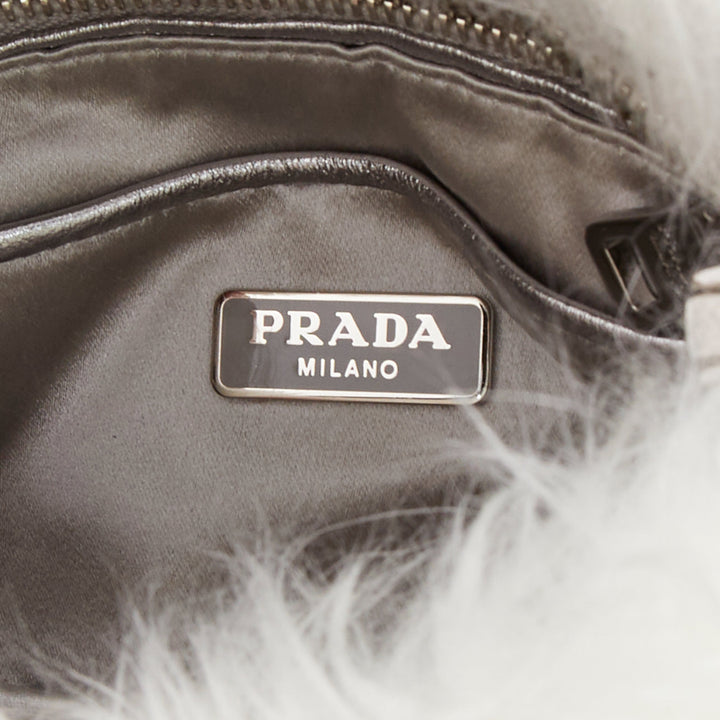 PRADA white faux fur silver triangle logo wristlet clutch bag