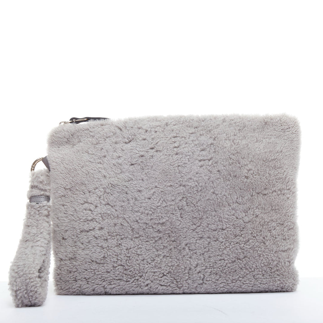 ERMENEGILDO ZEGNA grey lambskin shearling wrist strap zip clutch bag
