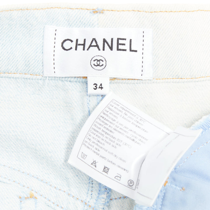 CHANEL 2018 Runway light blue washed denim horse buttons shorts FR34 XS
