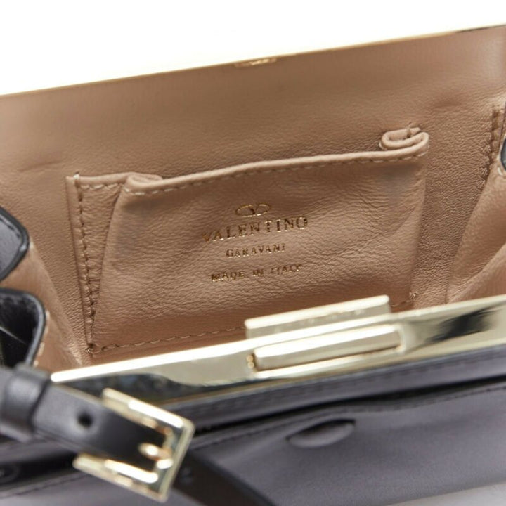 VALENTINO black leather gold rockstud metal frame miniaudiere clasp clutch bag