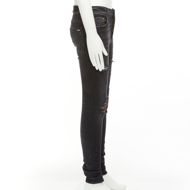 AMIRI black charcoal distressed brown pleated inserts washed skinny jeans 31"