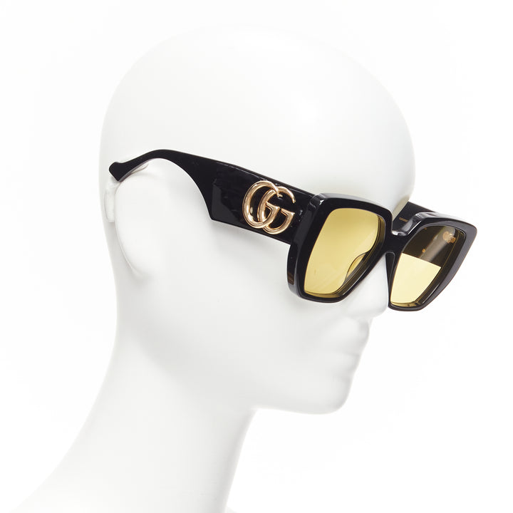 GUCCI GG0956S black gold GG logo yellow lens oversized sunglasses