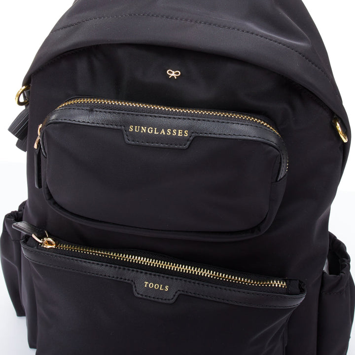 ANYA HINDMARCH Cycling black leather trim multi pocket shell backpack bag