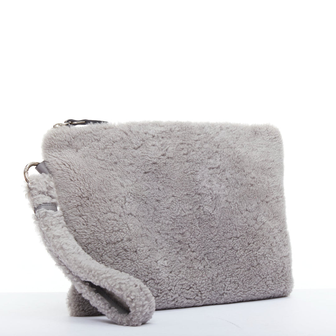 ERMENEGILDO ZEGNA grey lambskin shearling wrist strap zip clutch bag