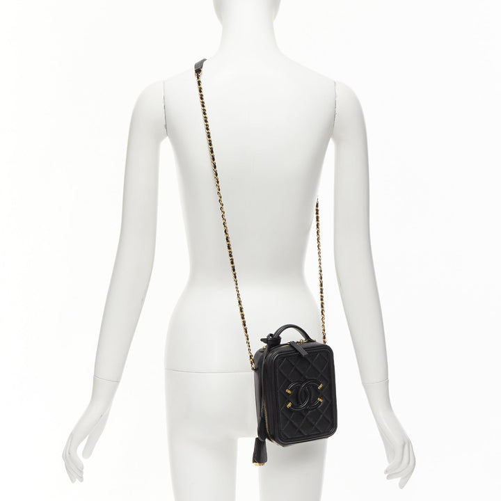 CHANEL N/S Vanity Vertical black filigree gold CC logo small crossbody bag
