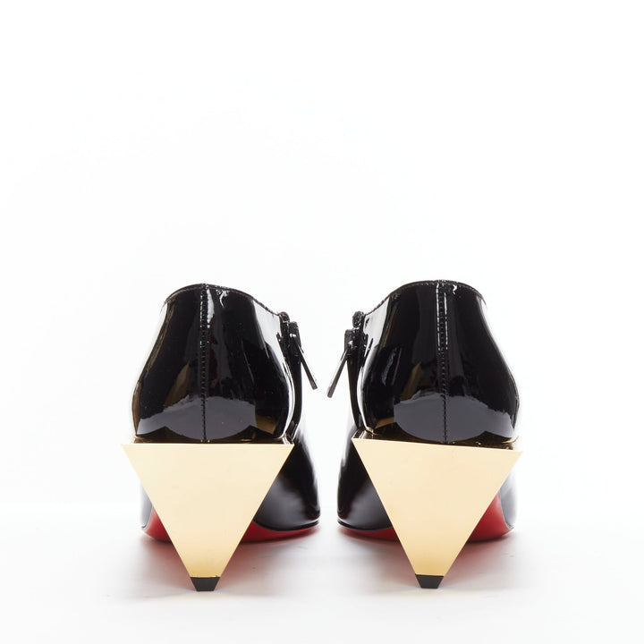 CHRISTIAN LOUBOUTIN Xilobooties 55 gold pyramid heel black patent pump EU38