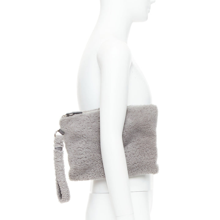 ERMENEGILDO ZEGNA grey lambskin shearling wrist strap zip clutch bag