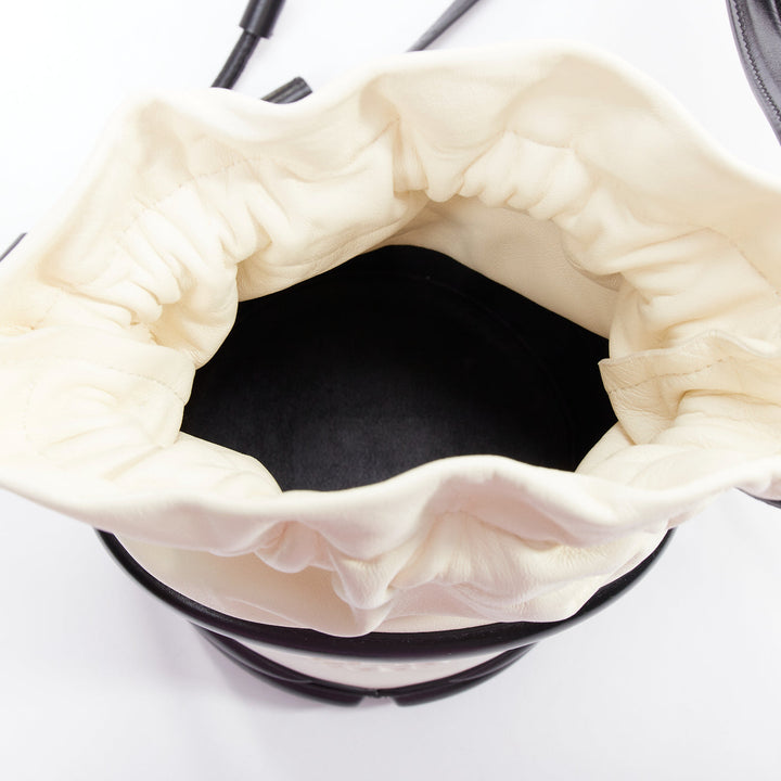ALEXANDER MCQUEEN Soft Curve AM logo black white leather bucket bag