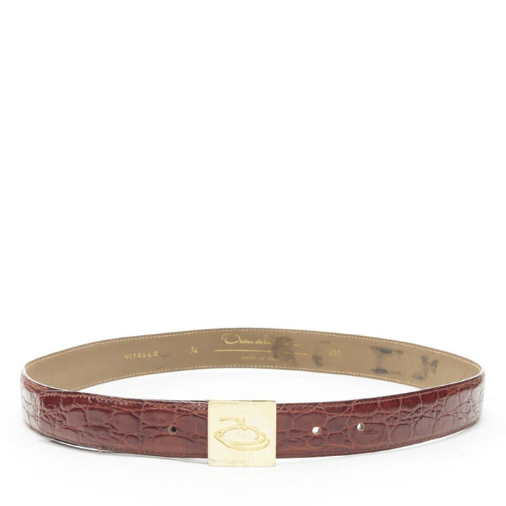 OSCAR DE LA RENTA brown stamped mock croc gold logo buckle belt 32"-36"