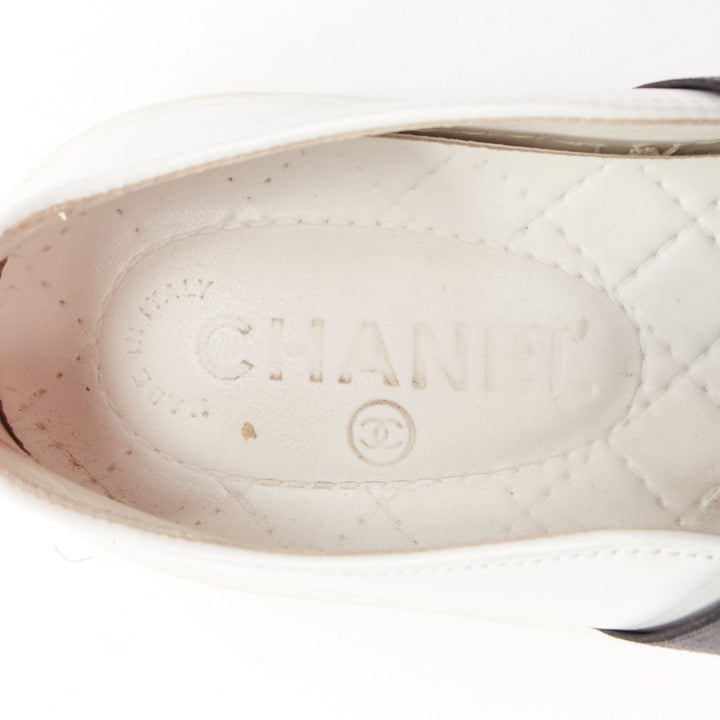 CHANEL black white leather CC logo back minimal classic skates sneakers EU36