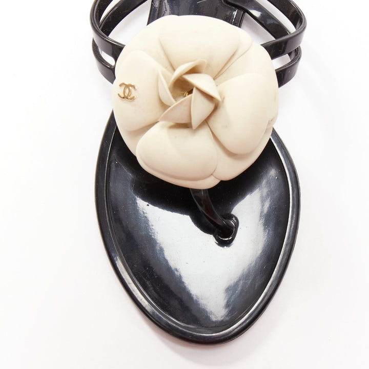 CHANEL cream rubber CC logo camellia black rubber thong slippers EU36
