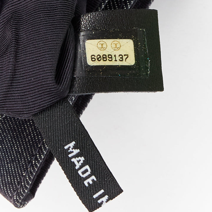 CHANEL Mademoiselle Chocolate Bar denim blue quilted clutch bag