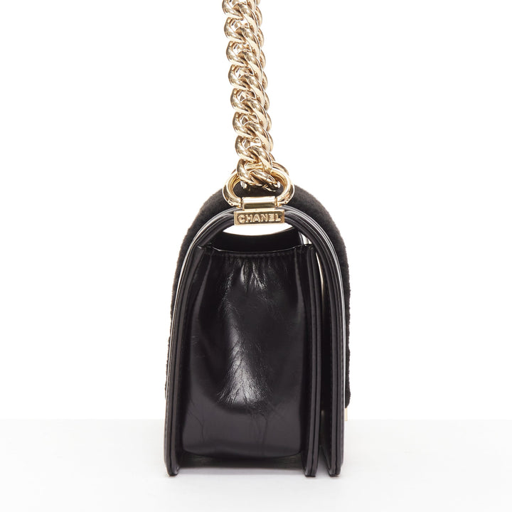 CHANEL Boy Small black shearling leather gold CC push lock chain flap bag