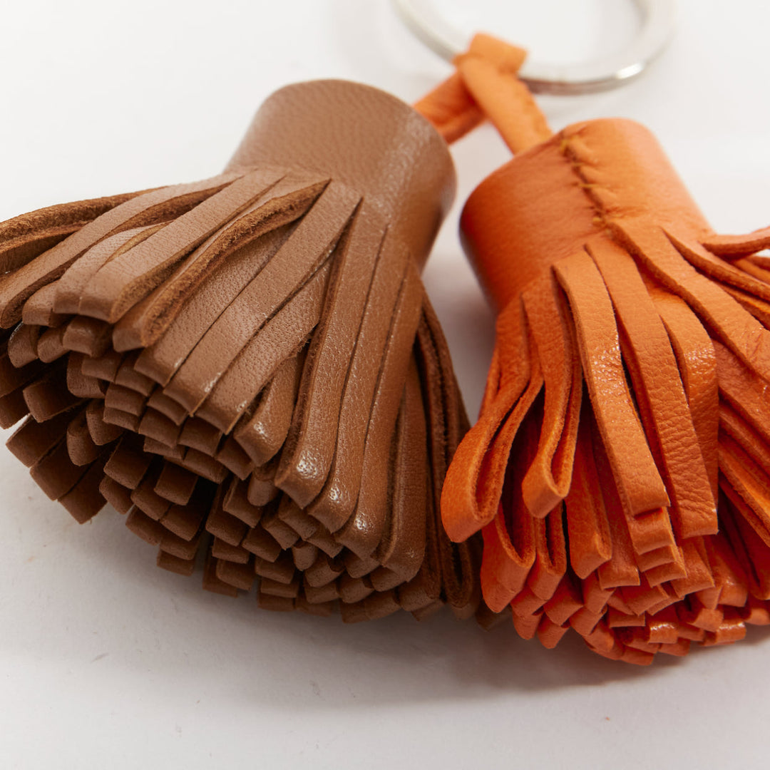 HERMES Carmen Uno Dos brown orange double tassel silver ring bag charm