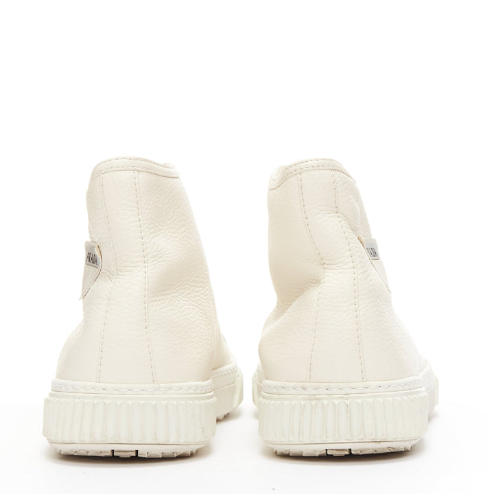 PRADA white textured leather black triangle logo high top sneakers UK7 EU40