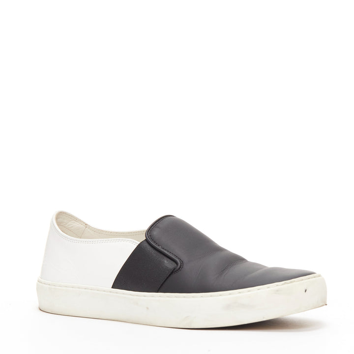 CHANEL black white leather CC logo back minimal classic skates sneakers EU36