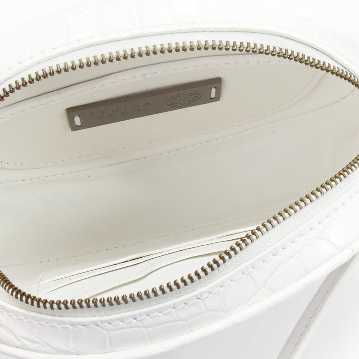 FERIDA YANG Emma white matte scaled leather oval crossbody belt bag
