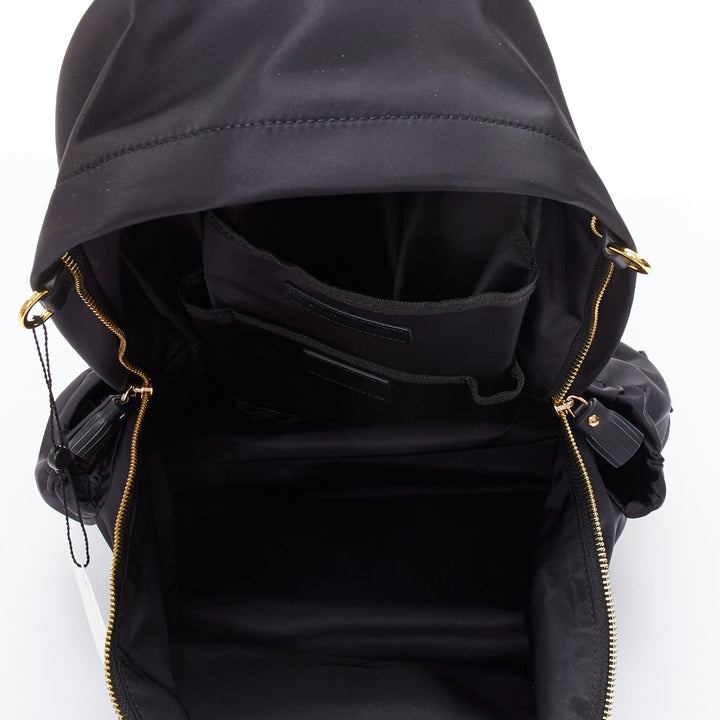 ANYA HINDMARCH Cycling black leather trim multi pocket shell backpack bag