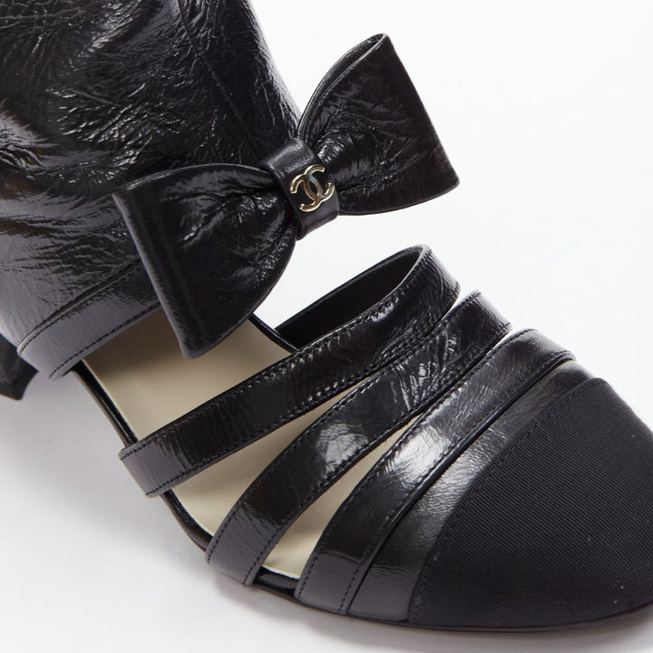 CHANEL 2023 Runway silver CC bow black leather cut out boots EU38.5