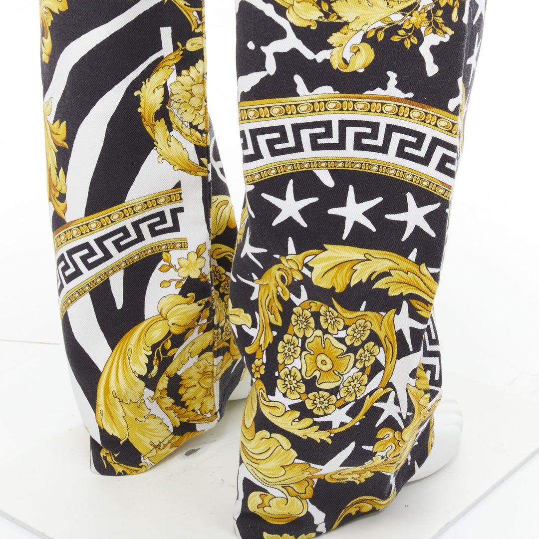 VERSACE 2019 Runway Savage Barocco gold Medusa stud jeans IT32