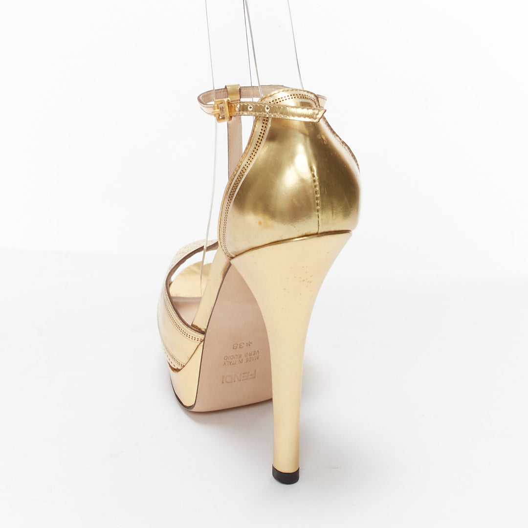 FENDI Flo metallic gold leather perforated tstrap peep toe platforms EU38