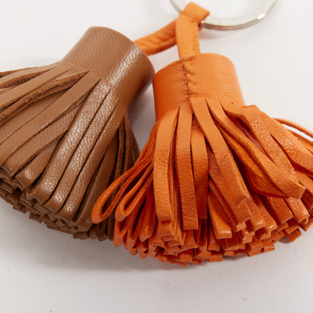HERMES Carmen Uno Dos brown orange double tassel silver ring bag charm