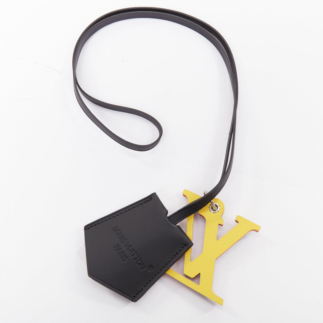 LOUIS VUITTON optic blue yellow logo black leather luggage tag