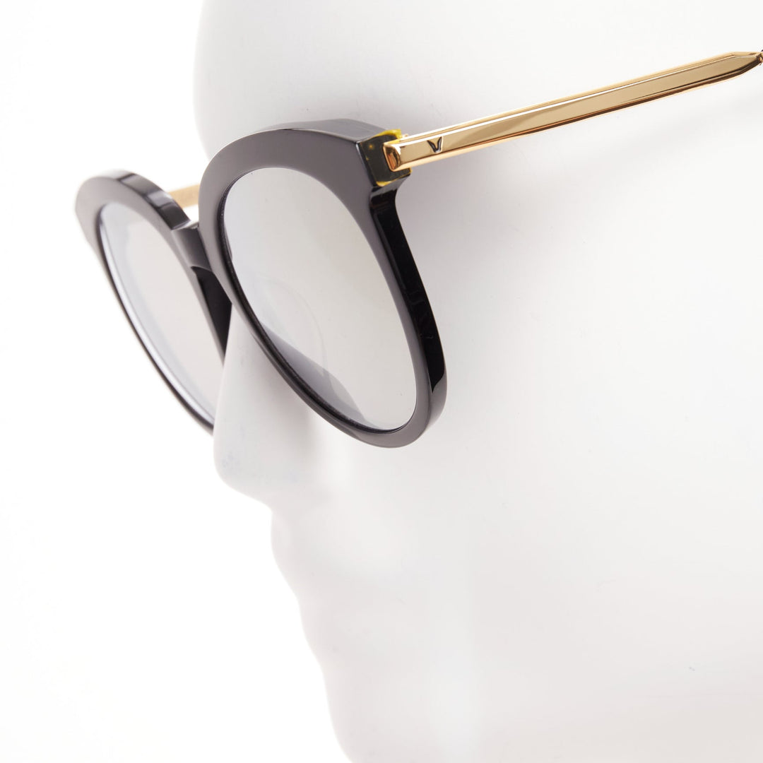 GENTLE MONSTER Lovesome black reflective lens gold oversized sunglasses