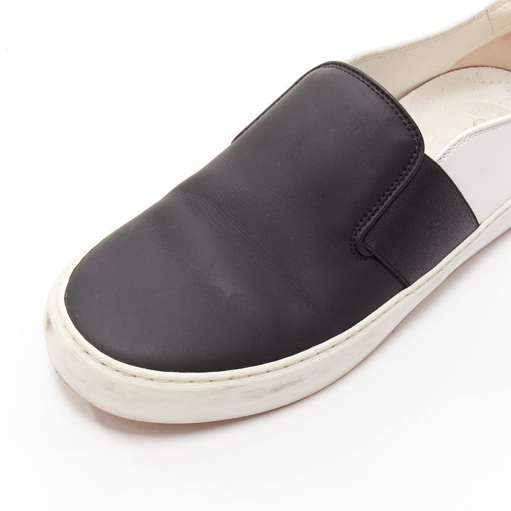 CHANEL black white leather CC logo back minimal classic skates sneakers EU36
