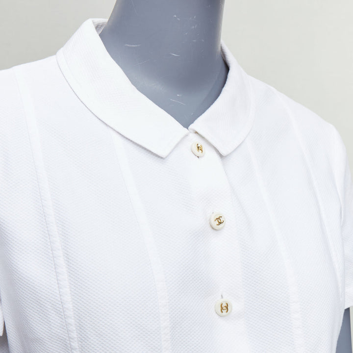 CHANEL Vintage 1990's white cotton gold CC logo button panelled crop shirt