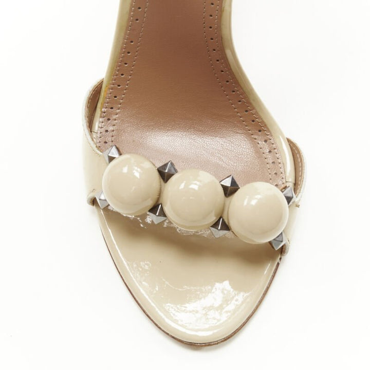 ALAIA La Bombe ball embellished studded nude patent high heel sandal EU37.5