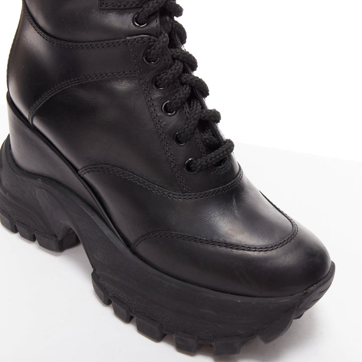 MIU MIU Runway black leather logo lace up chunky wedged military boots EU39